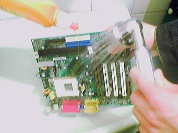 I don't think that's the proper way of cleaning your motherboard... 