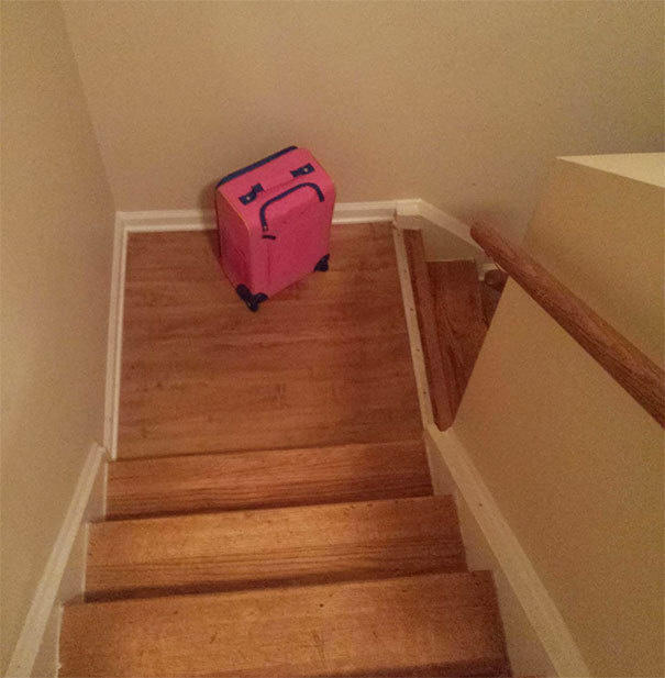Her suitcase looked really sad when it was left on the stairs. 