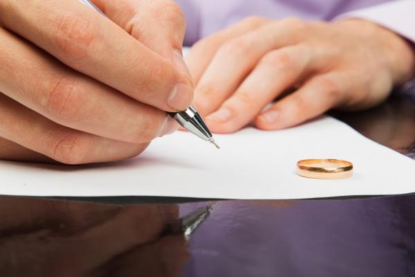 man-writing-divorce-letter