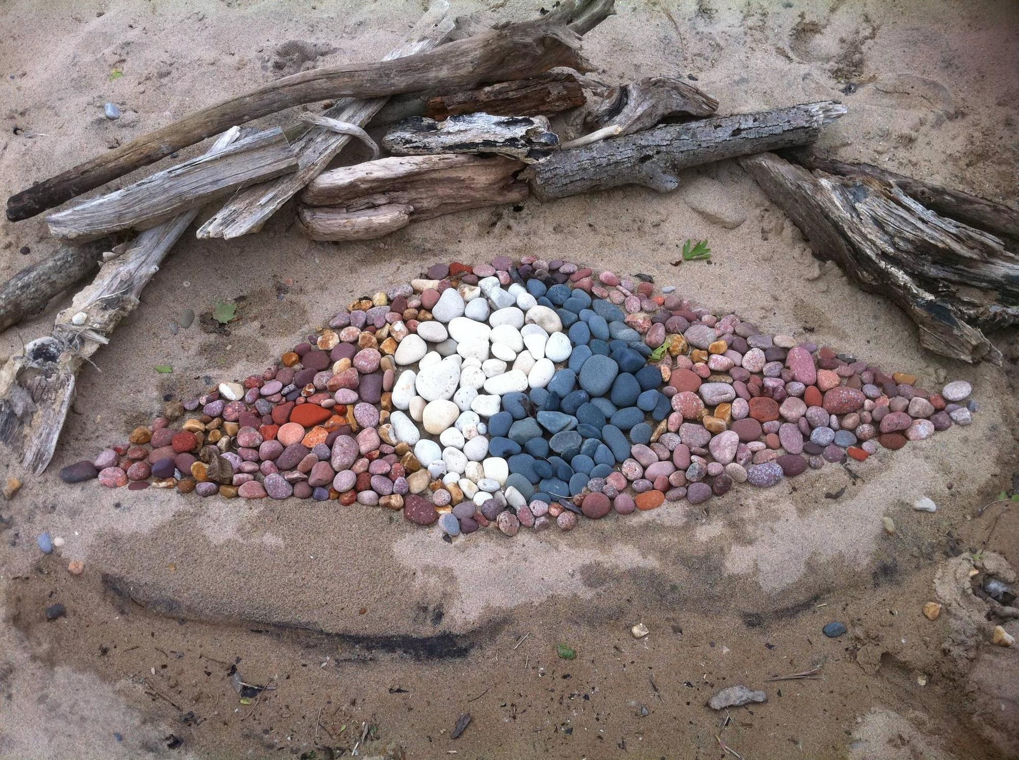 A lucky person stumbled upon this rock design on the beach.