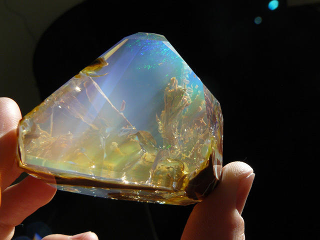 This is an ocean opal, which gives the illusion of a tiny ocean scene inside the stone.
