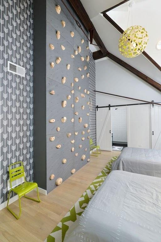 The best part of the house might be the "kid room," which boasts it's very own rock climbing wall.