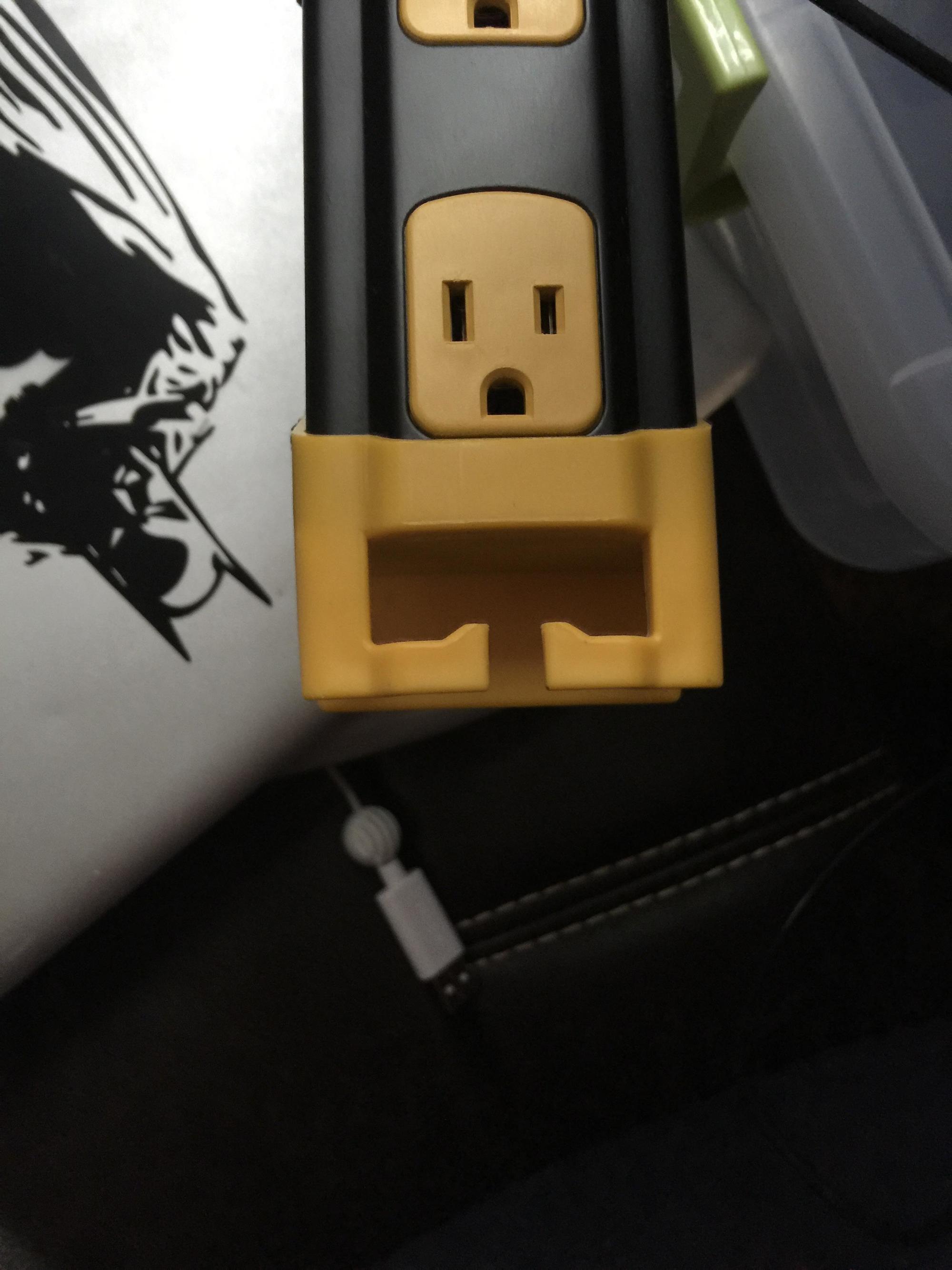 The power strip outlet that looks like a tough guy.