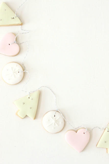 Want to combine your baking and decorating skills? Bake some sugar cookies and turn them into a garland. 