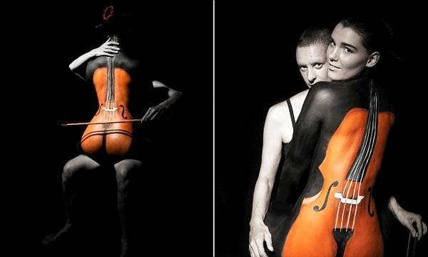BNPS.co.uk (01202 558833) Picture: SimonCatesby/BNPS ****Please use full byline**** A naked woman is transformed into a curvaceous cello using nothing but paint and clever photography. The creation is the work of bodypainter Anke Catesby who spent three hours painstakingly turning her model into the musical instrument. Anke, from Brisbane, Australia, convinced friends Tara Mills and Jo Sparrow to strip off to make her cello creation after spotting the similarity between the instrument and a woman's body while looking at black and white nude photos. The stunning result uses the curves of Tara's back to create the shape of the instrument while Jo's hands are seen 'playing' the instrument.