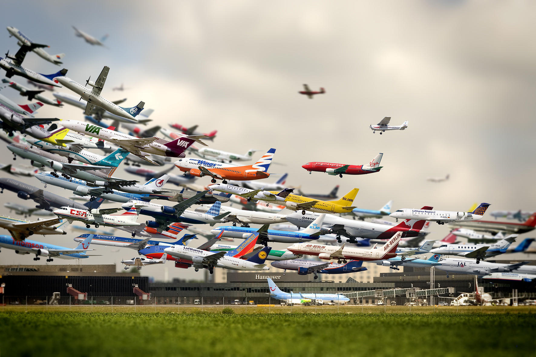 A multiple exposure shot of various airplanes taking off at the Hannover Airport. 