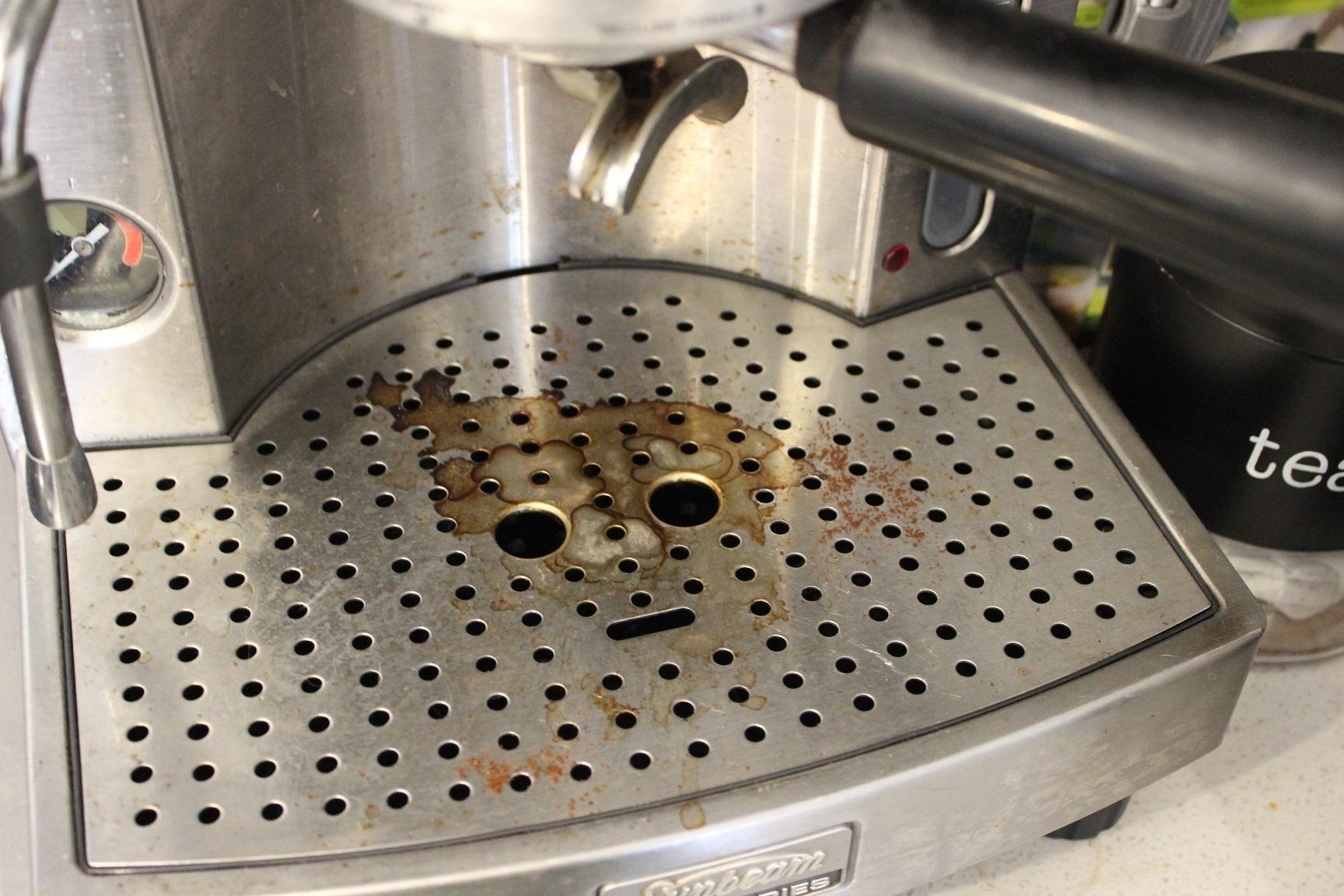 The face in the espresso machine is always watching.