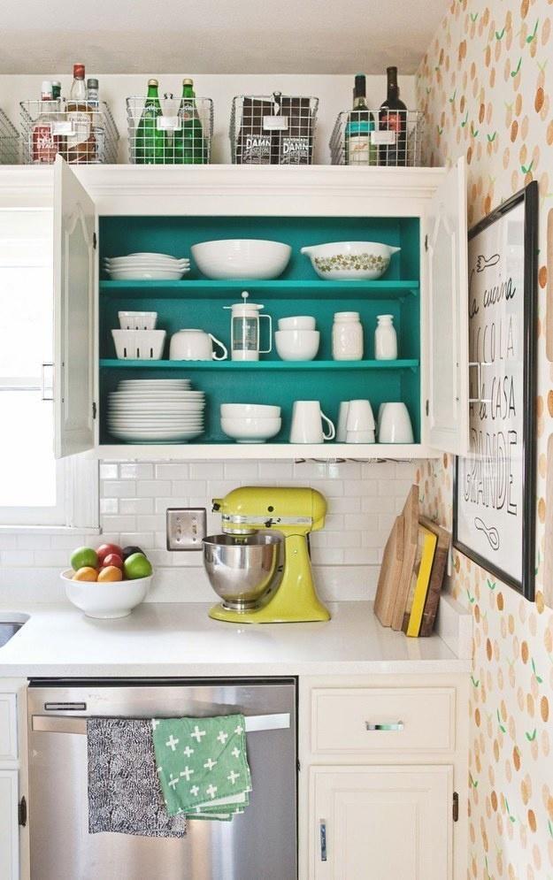 Paint the inside of your kitchen cabinets any color of your choice for a sleek looking kitchen.