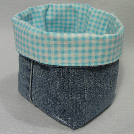 Store just about anything in these cute <a href="http://www.threadingmyway.com/2012/06/denim-fabric-baskets-tutorial.html" target="_blank">jean baskets</a>.