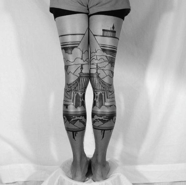 A landscape of a temple and mountains beautifully illustrated symmetrically on the back of each leg. 