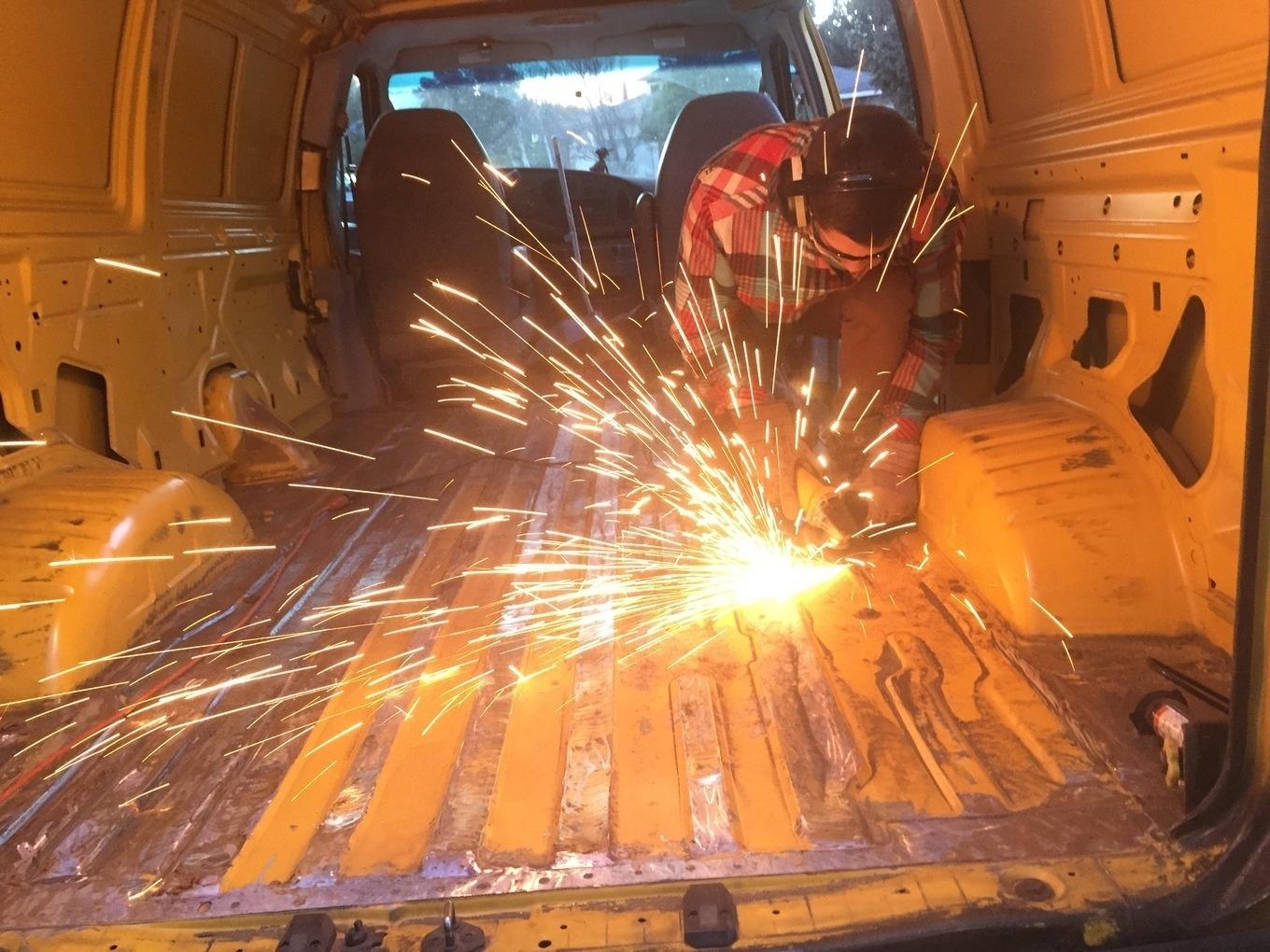 The heavy-duty angle grinder tackled the rust issue.