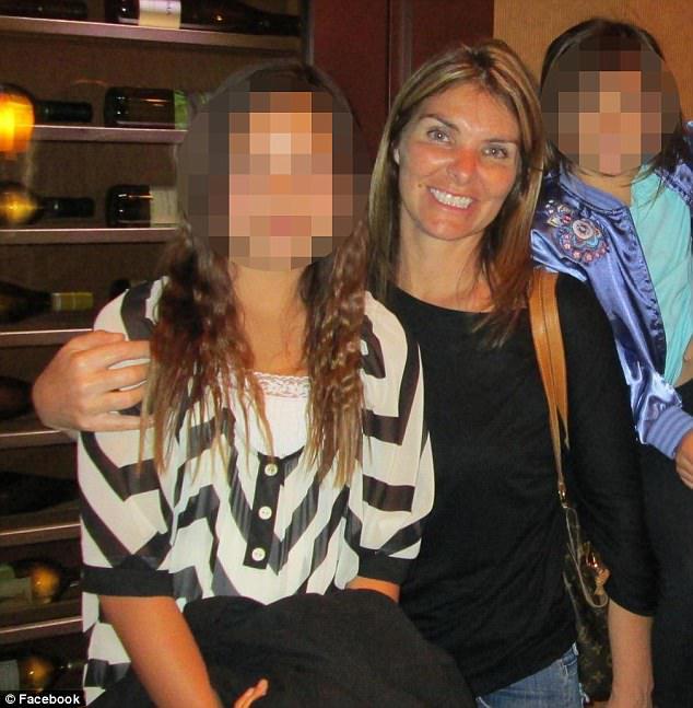 The 48-year-old woman (pictured with her children) is accused of employing a teenager to sell marijuana to her peers