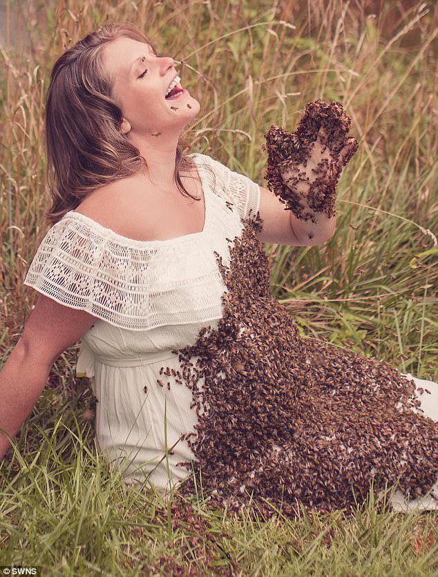  Mueller runs Mueller Honey Bee Removal with her husband and was comfortable enough to pose with hundreds of insects