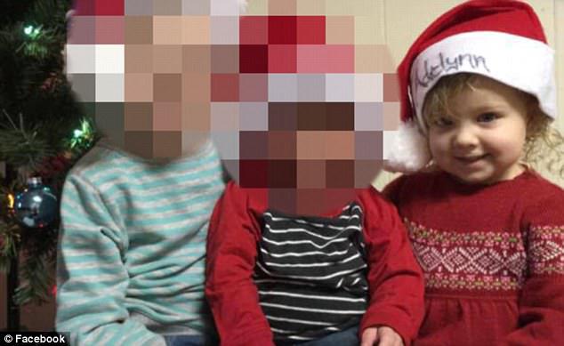 Beaten to death: An autopsy showed three-year-old Adelynn (pictured with her brothers last Christmas) died from a skull fracture caused by blunt force trauma 