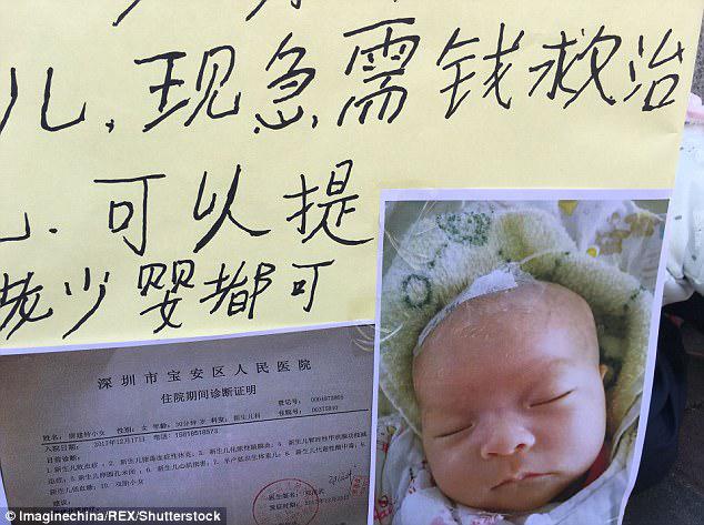 The couple need 100,000 yuan (£11,262) to save their younger twin daughter (pictured)