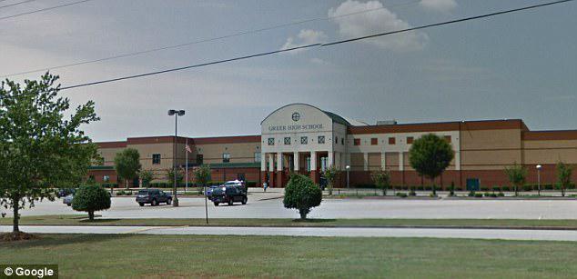 Sheriff’s deputies said they found the married high school teacher partially undressed with a student in a car that was parked suspiciously on a South Carolina road Thursday evening. Greer High School is seen in the above stock image