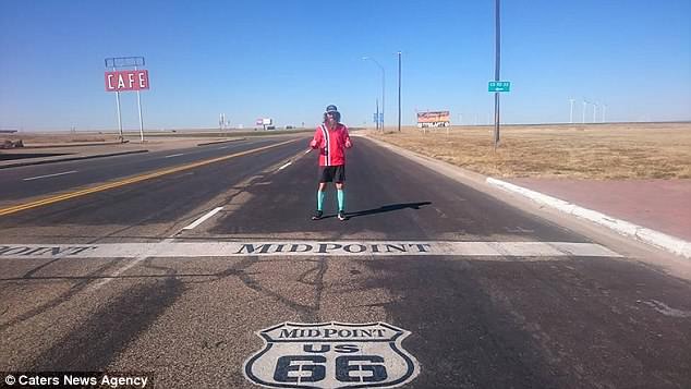 Rob ran through many iconic US landmarks - including the midpoint of Route 66 (pictured)