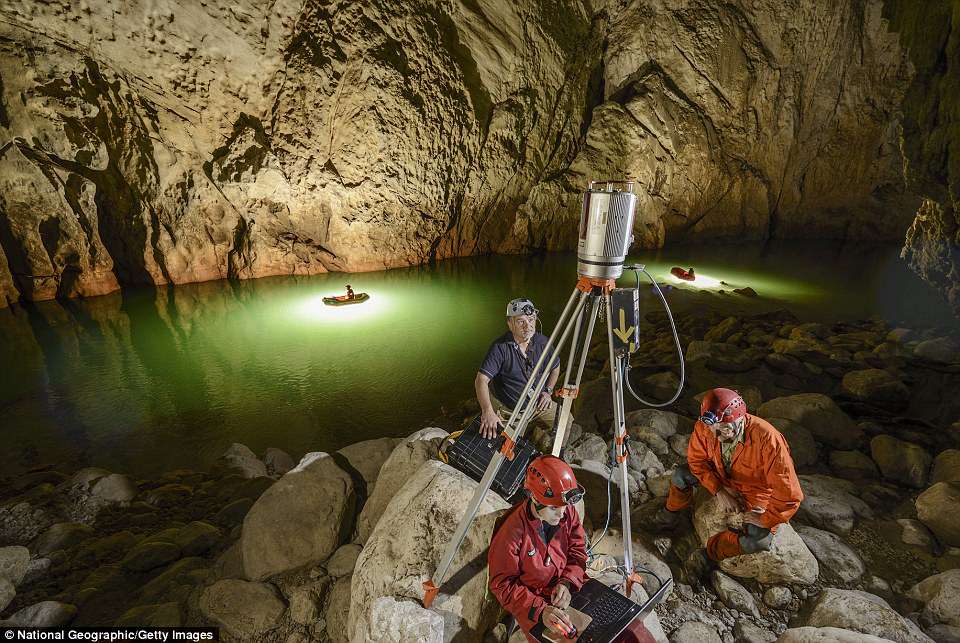 Daniela Pani (foreground), Andy Eavis (right) and Roo Walters set up a laser scanner near the flooded entrance gallery in an 2013 expedition toÂ measure the cavern in great detail using the cutting-edge laser-mapping technology (file photo)