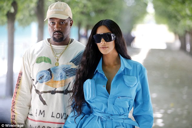 Smitten: Kim is now married to American rapper, Kanye West, and the couple have three children together - North, five, Saint, two, and Chicago, five months