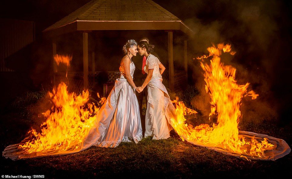 Great gowns of fire! Adrenaline junkies April Choi and Bethany Byrnes decided to pull a very daring stunt at their wedding, by torching their gowns while still wearing them