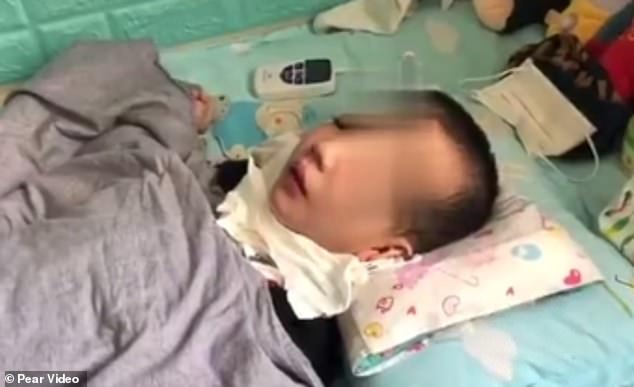 A woman in north-west China was sentenced to 16 years in prison for physically abusing her six-year-old stepson Peng Peng (pictured) leaving him in a vegetative state