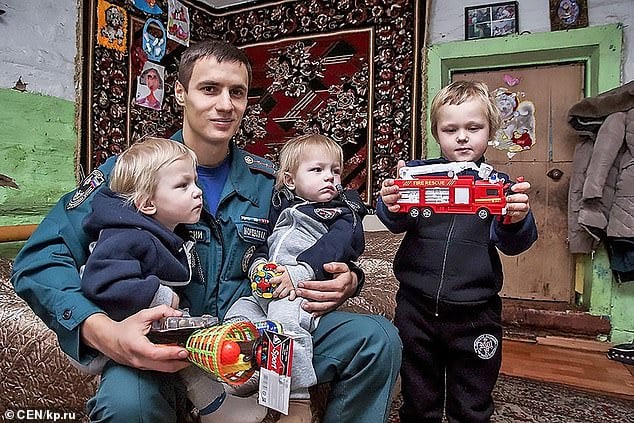 Aleksandr Mordvov with children Danil (right) and the twins Sasha and Denis. The fireman had saved the family on a previous occasion after a downstairs flat caught fireÂ 