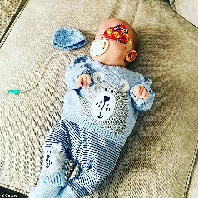 On five separate occasions, doctors told George's parents, Hanna Rose, 25, and her partner Daniel Bownes, 27, that baby George would die. He is now at home, pictured