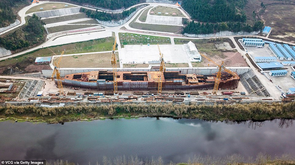 The replicated Titanic being built in Suining, south-west China, was half complete in 2017, according to the Chinese media. Pictured hereÂ on a bank of Qijiang River at Daying County on February 15, 2019